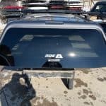Gray truck bed cap for F150 with color code M7, model N4713757.