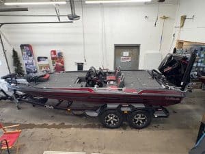 Fishing boat on trailer at Camp & Cruise, ready for outdoor adventures.