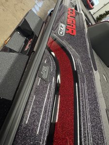 Bass boat with Mercury 200 Pro engine and custom decals.