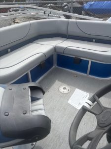 Boat seating with cushioned benches at Camp and Cruise. Perfect for relaxing and enjoying water.