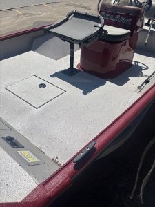 Fishing boat deck with tackle storage, electronics, and seating for anglers. Perfect for freshwater.