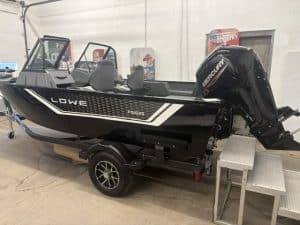Black Lowe fishing boat with Mercury outboard motor at Camp and Cruise.