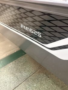 Modern boat with geometric black and gray design, model FM1625.