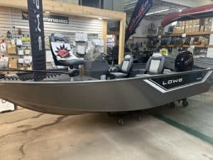 Fishing boat with seats and trolling motor at Camp and Cruise.