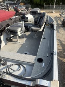 Lund 1600 SC fishing boat with Mercury 50 engine and seating.