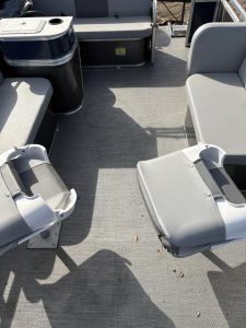 Close-up of boat deck with seating and flooring for Paddle King LoPro Cruiser.