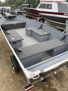 2025 Starcraft 16 Seafarer DLX boat with trailer at marina.