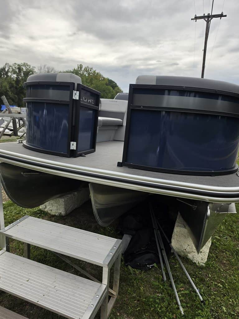 Lowe LS 210 Tri-Toon boat with Mercury 150 Pro XS engine on a trailer.