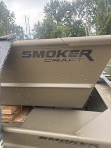 Close-up of Smoker Craft 1648 Jon Boat with logo visible.
