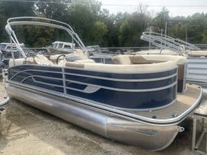 Lowe SS210 walk-thru pontoon boat with beige interior and blue exterior.