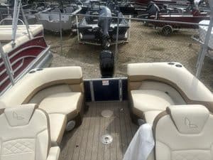 Lowe SS210 boat interior with seating and steering console.