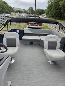 Lowe LS 210 Tri-Toon boat interior with seating and canopy.