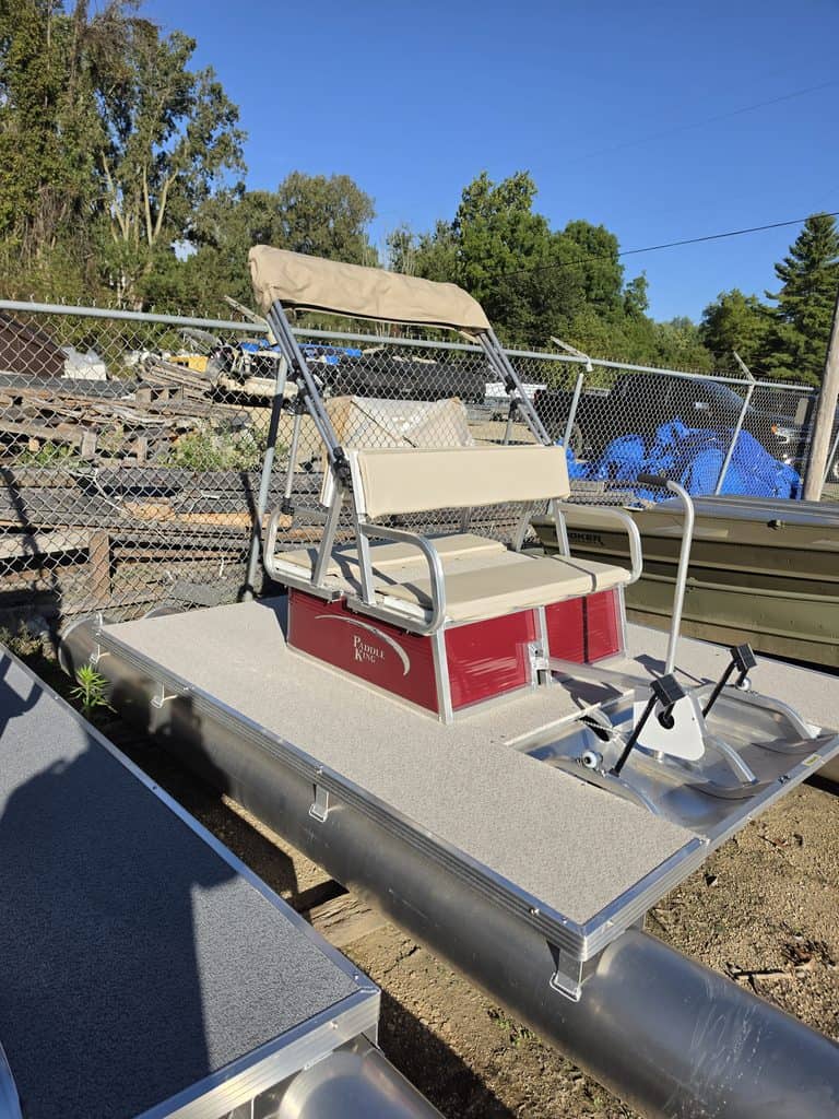 PaddleKing PK4400 paddle boat on display at a dealership.