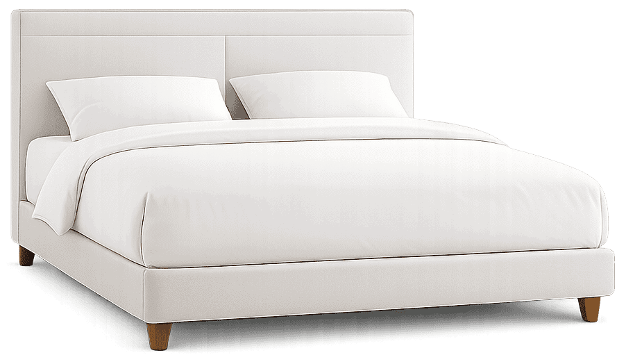 Clean white upholstered bed with pillows in a modern bedroom setting.