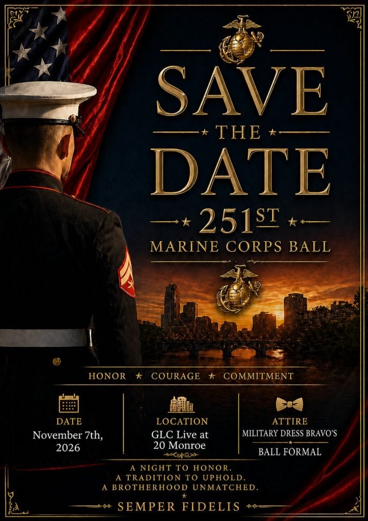 Marine in dress uniform with city skyline at sunset for 251st Marine Corps Ball.