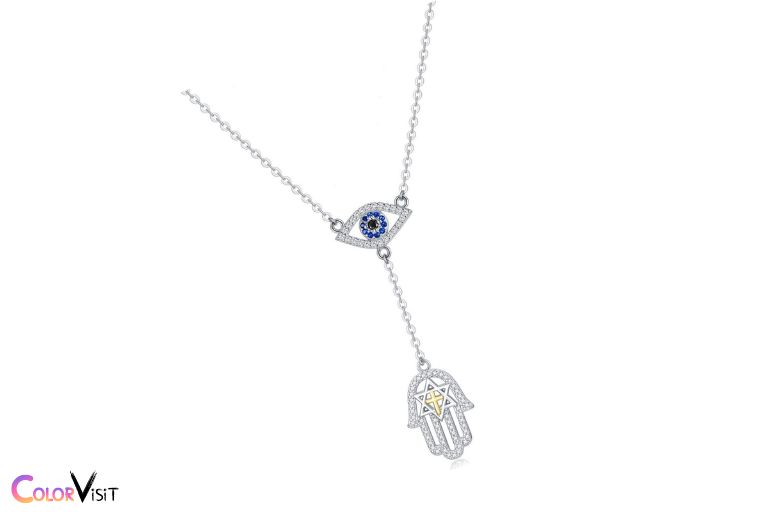 What Are the Benefits of Metallic Bangles Statement Earrings or Silver Pendant Necklaces with a Black Dress and Nude Kitten Heels