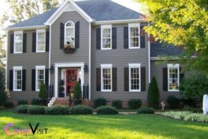 grey house black shutters what color door