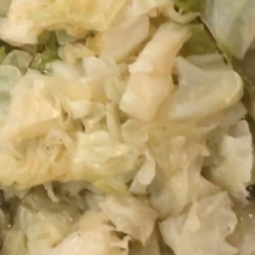 Fresh chopped cabbage, ideal for soul food recipes, salads, and side dishes. Perfectly prepared for authentic Southern cuisine at Corine's Cakes & Catering.