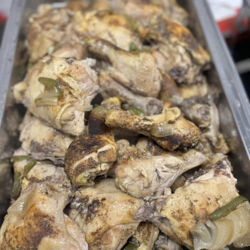 Succulent baked chicken pieces seasoned with herbs and spices, perfect for soul food lovers.