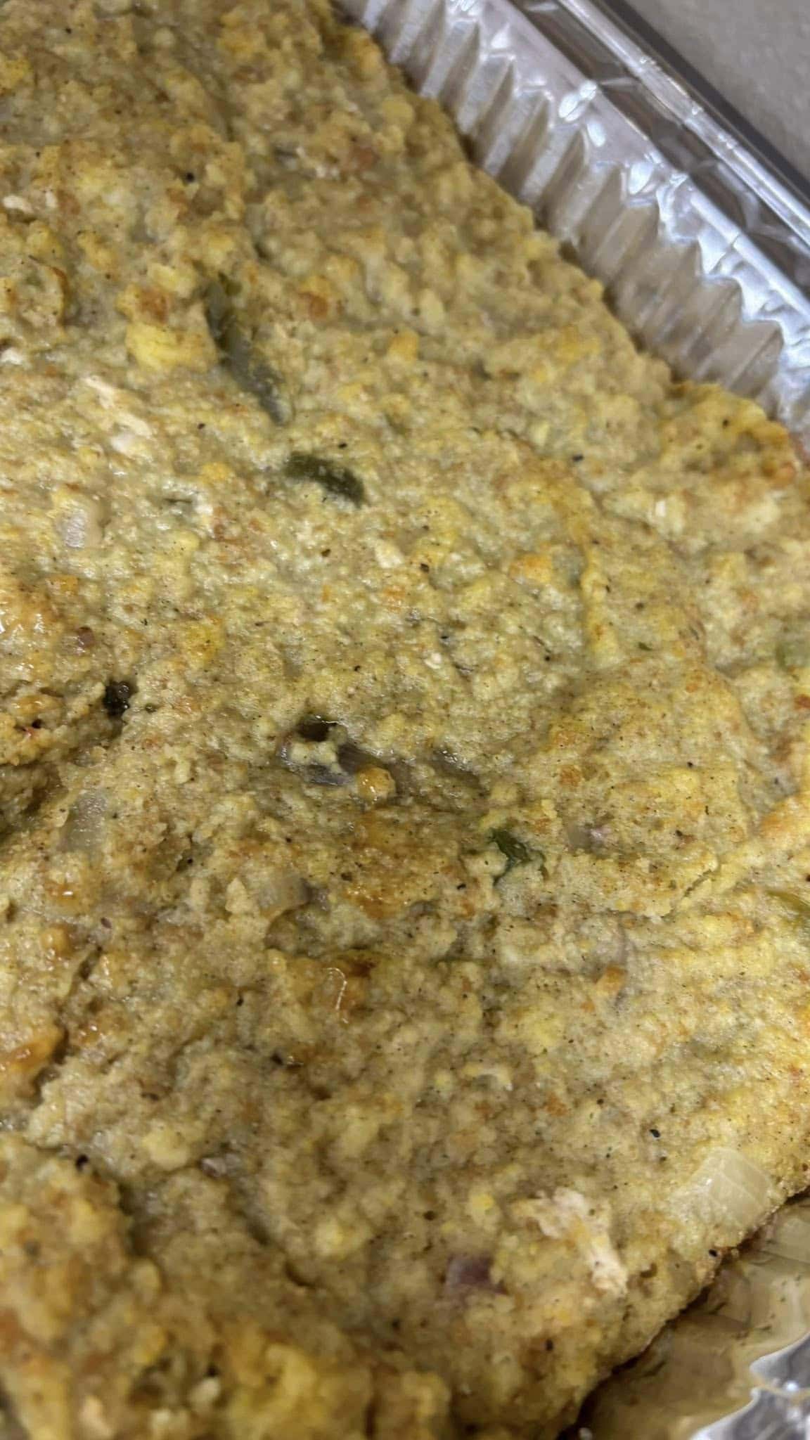 Delicious homemade dressing with herbs and spices, perfect for family dinners or special occasions. Made fresh daily to complement your favorite soul food dishes.