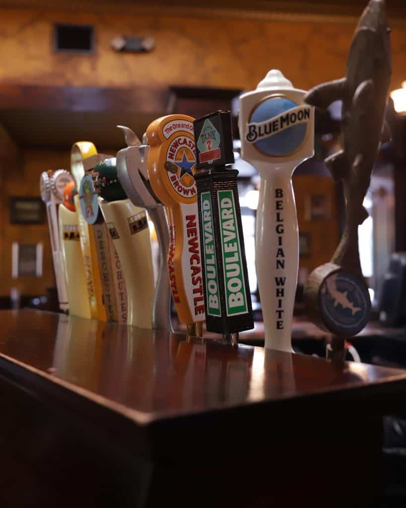 Collection of beer tap handles at Dublin Square in Lansing, MI.