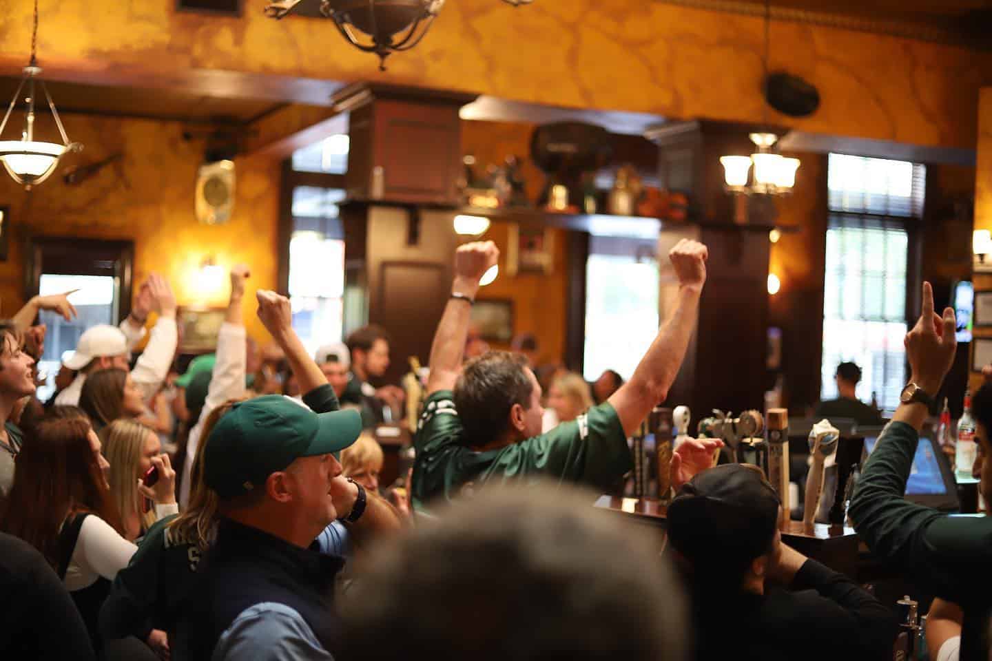 Crowd enjoying live sports at Dublin Square in Lansing.