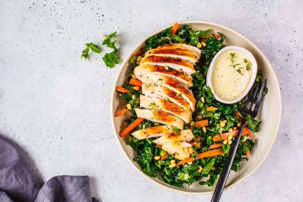 Fresh salad with grilled chicken, vegetables, and dressing at Dublin Square.