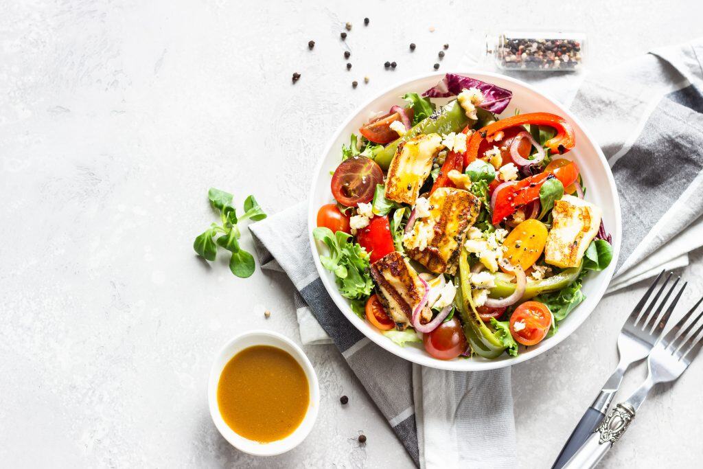 Colorful garden salad with cherry tomatoes, cucumbers, and grilled chicken at Dublin Square.