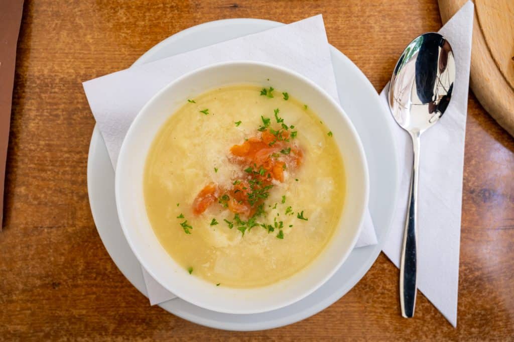 Creamy soup with herbs and salmon served at Dublin Square.
