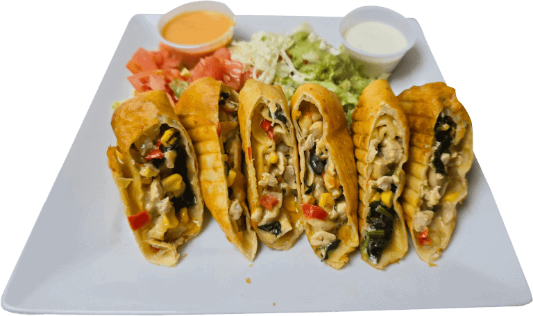 Delicious Mexican tacos with beans, rice, and fresh salad at El Mesquite.