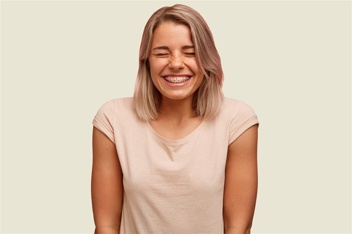 Smiling teen with braces