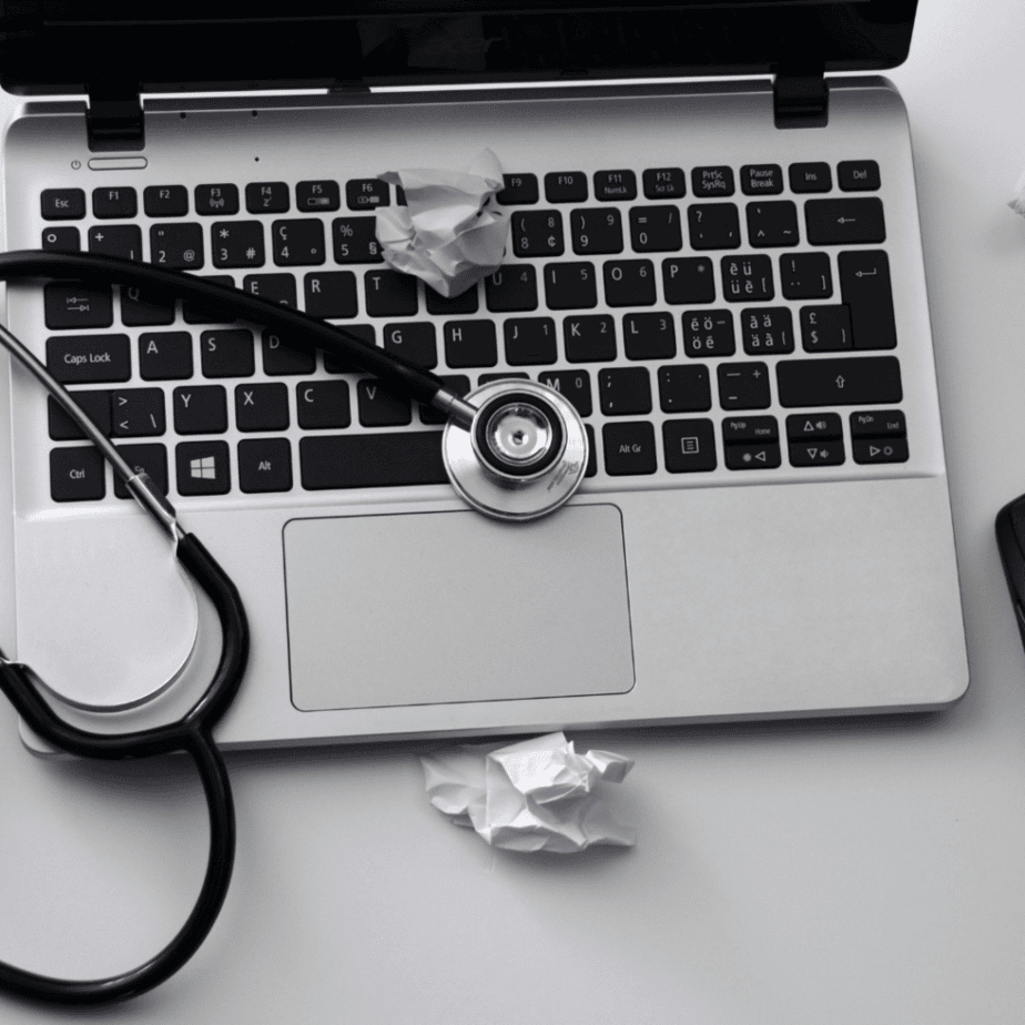 laptop with a stethoscope on top