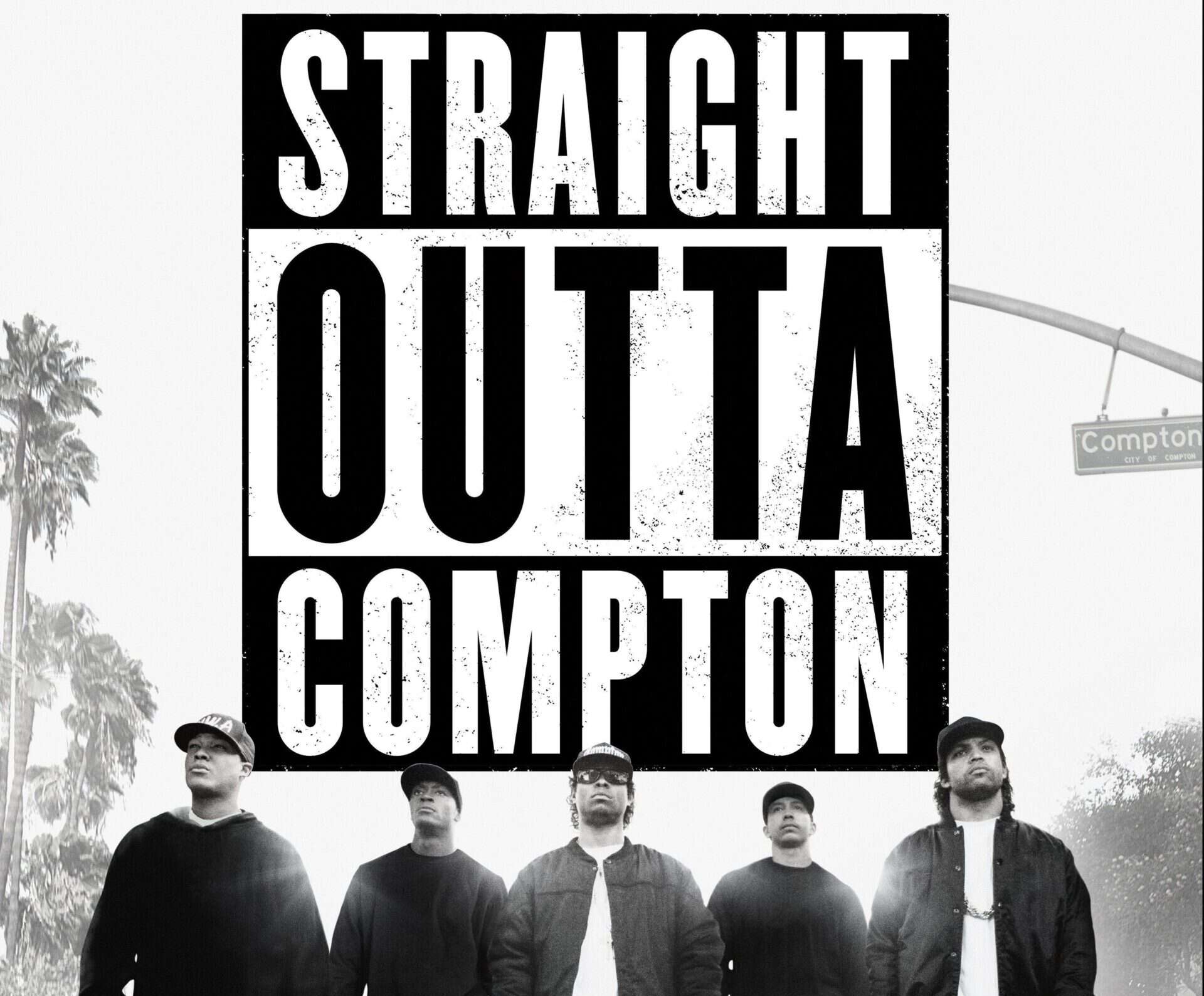 Hip hop group photo with 'Straight Outta Compton' text overlay.