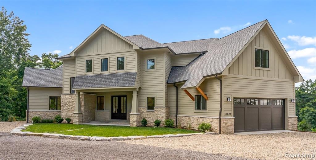 Gracefully positioned between the Galien River and Lake Michigan, this exceptional 5,000 sq. ft, five-bedroom, four-and-a-half-bath NEW CONSTRUCTION is located on an elevated site just a short stroll to the association's private beach and only minutes to downtown New Buffalo. Enjoy tranquil views of the Galien River from multiple living spaces, creating a picturesque backdrop.The home's open-concept floor plan is anchored by a dramatic two story family room that flows effortlessly into a gourmet kitchen featuring a spacious walk-in pantry and adjoining dining area. The main-level primary suite is a private oasis, featuring vaulted ceilings, two expansive walk-in closets, and an ensuite bath. Upstairs, three spacious bedrooms and two full baths provide comfortable accommodations for guests.The fully finished sun drenched walk-out lower level adds remarkable versatility, offering a private guest suite with an ensuite full bath, a dedicated workout room, storage room and expansive recreation space.Outdoor living is equally impressive, featuring a screened-in porch and a stunning vaulted sun deck overlooking the surrounding landscape. The generously sized yard offers an unparalleled canvas for a future pool nestled in a private wooded setting.Additional highlights include an attached two-car garage, conveniently located first-floor laundry, white oak flooring, bluestone entrance and timeless finishes that reflect the home's exceptional craftsmanship.Tucked away at the end of a private road, this exceptional home and site offers what is timelessly desired yet rarely available...a perfect balance of privacy, hilltop unobstructed views, walk to private beach, three finished levels, AND nearby downtown conveniences. Constructed by James Vondrasek of James Companies LLC, a nationally recognized residential developer in destination locations, known for superior craftsmanship, thoughtful design, meticulous attention to detail, and uncompromising quality.