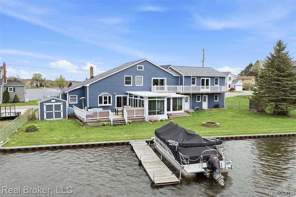 **Open House Saturday 12:30PM - 2:00PM and Sunday 12:00PM - 1:30PM** Experience luxury lakefront living at 2299 Kingston. This 2,900 sq. ft. home in White Lake was extensively renovated in 2025 into a high-end, move-in-ready retreat. The interior features a professional top-to-bottom refresh with new paint on all walls, trim, and doors, elevated by new hardwood floors throughout the entire home and both staircases. The reimagined primary suite is a true standout, boasting a massive walk-in dressing room with custom California Closets and a dedicated vanity station. New window shades have been installed throughout the home, including specialized blackout shades in the upper-level movie room. Energy efficiency is prioritized with new whole-home insulation. The backyard is a private wellness oasis featuring an infrared sauna, hot tub, and a premium seawall with a private dock. Tech and mechanical updates offer total peace of mind: a professionally installed EV charger, owned water softener, and a pre-paid 3-year HVAC maintenance contract. With a newer roof, well, and HVAC (2019), this home combines bespoke luxury with mechanical excellence.