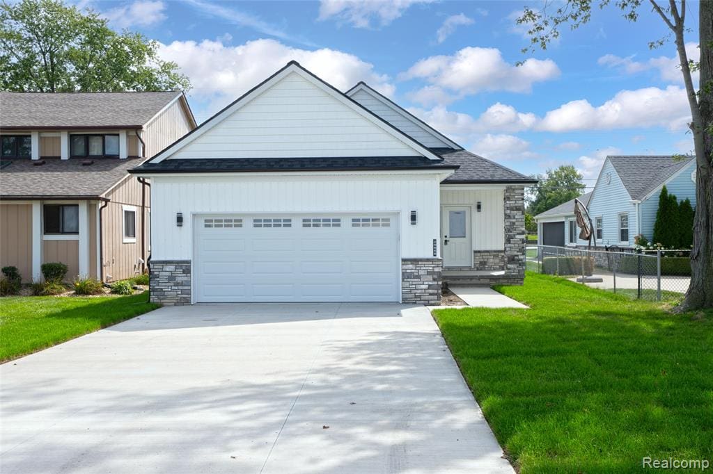 Welcome to 29668 Old North River Road in Harrison Township, where modern finishes and waterfront living come together in this beautifully designed  (and hard to find) new construction RANCH home. Everything is fresh, clean and ready for its first owner.Inside, you’ll find an open, light-filled design featuring wide-plank luxury vinyl flooring, modern fixtures and hardware, recessed lighting, and thoughtfully selected finishes throughout. Warm wood cabinetry paired with light quartz countertops creates a clean, modern feel, while the beautifully finished bathrooms continue the same cohesive design. A dedicated first-floor laundry room offers abundant cabinetry, a utility sink and additional storage, while generous closets and a walk-in pantry provide plenty of everyday functionality. The primary ensuite features a large walk-in closet, a spacious bathroom with double vanity and picturesque views of the river. The oversized attached garage and expansive driveway offer exceptional parking and storage, perfect for the waterfront lifestyle. Out back, the large yard stretches all the way to the Clinton River, with a private walkway leading to your docks and direct access to the water. Enjoy boating, fishing, entertaining or simply relaxing along the river from your own backyard. This property is a boater's paradise and features 3 boat wells, including a big cut-in well, suitable for a large boat. Approximately 25 min to Lake St. Clair and an easy boat ride to multiple restaurants located on the river. Located in the heart of Harrison Township, this is a rare opportunity to own new construction directly on the Clinton River and enjoy the best of the Lake St. Clair boating lifestyle. Brand new, beautifully finished and waterfront. Immediate Occupancy.....just move in and start enjoying!