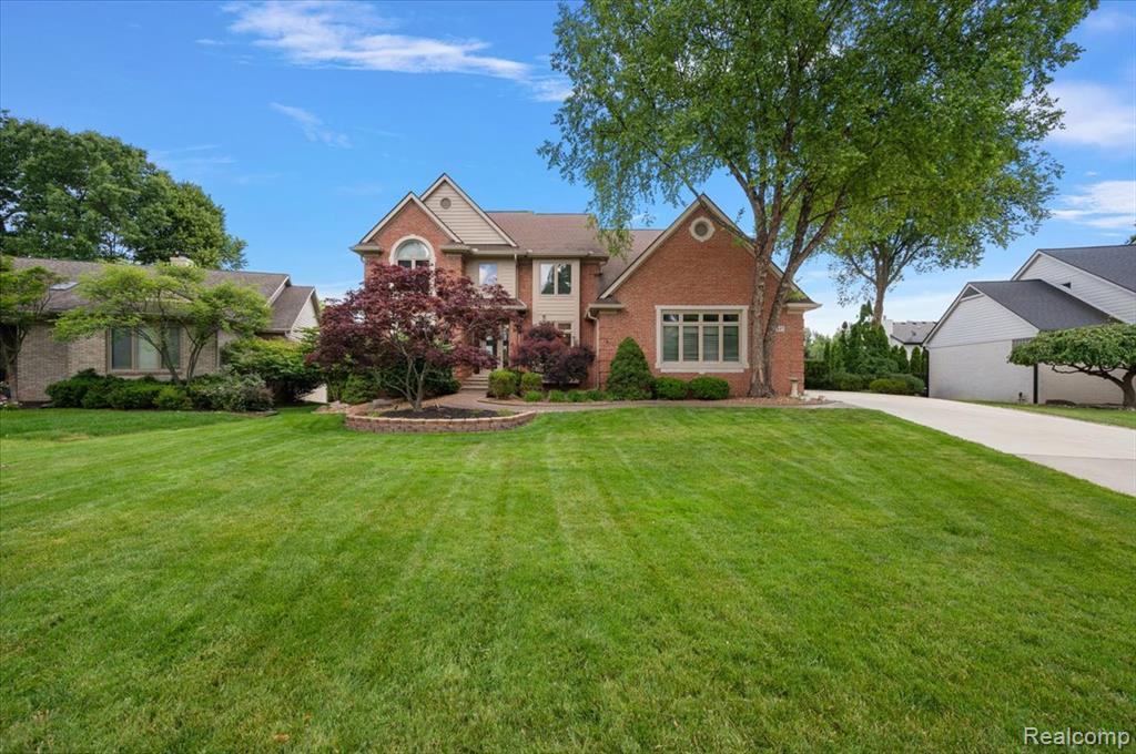 Enjoy Lake Life in the Gated community of Forest Bay! Over 5,300 square feet of finished living space, this custom-designed home features 4 bedrooms, 3 and a half baths, 2nd floor laundry room and a deeded boat slip (#46) in the private marina on Cass Lake.Step into the 2 story Great Room with 2 way fireplace looking through to the eat in kitchen. Huge main floor office. 9-foot ceilings on main level, cathedral and tray ceilings in bedrooms. Luxury Primary suite with spa tub and walk in closet. Spacious finished walkout basement that includes a full bath, work out room, flex room and plenty of storage. Designed for comfort and efficiency, the home features dual-zone heating and cooling, a 26kW Generac whole-house generator (2023), Navien tankless water heater (2024), smart hot water recirculation system (2025), WiFi-enabled smart home features, hard-wired security system, built-in indoor and outdoor speakers, and a separate irrigation meter that eliminates sewer charges for lawn watering.Recent updates include many Low-E replacement windows (2023), American Whirlpool hot tub (2023), Sherwin-Williams exterior paint (2023), whole-house water filtration system, new gutters, new driveway (2025), interior paint (2023), and a roof (2015).  The beautifully landscaped grounds are highlighted by premium LED landscape lighting. Resort-style amenities including a private beach on the no-wake bay, private boat launch, tennis/pickleball courts, sand volleyball, and beautifully maintained common areas. Just 20 minutes to Birmingham and 35 minutes to downtown Detroit.