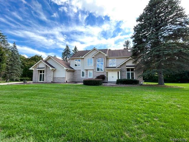 This lovely home sits on a very large cul-de-sac lot