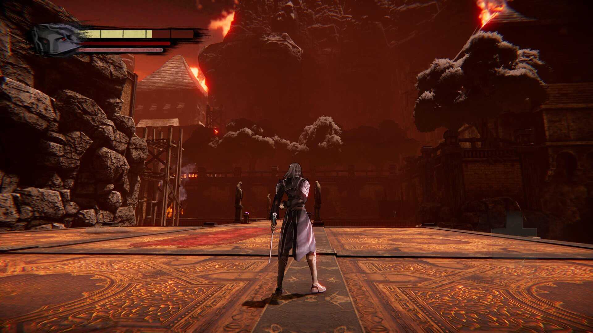 A man stands on a platform, observing a large monastery as it burns