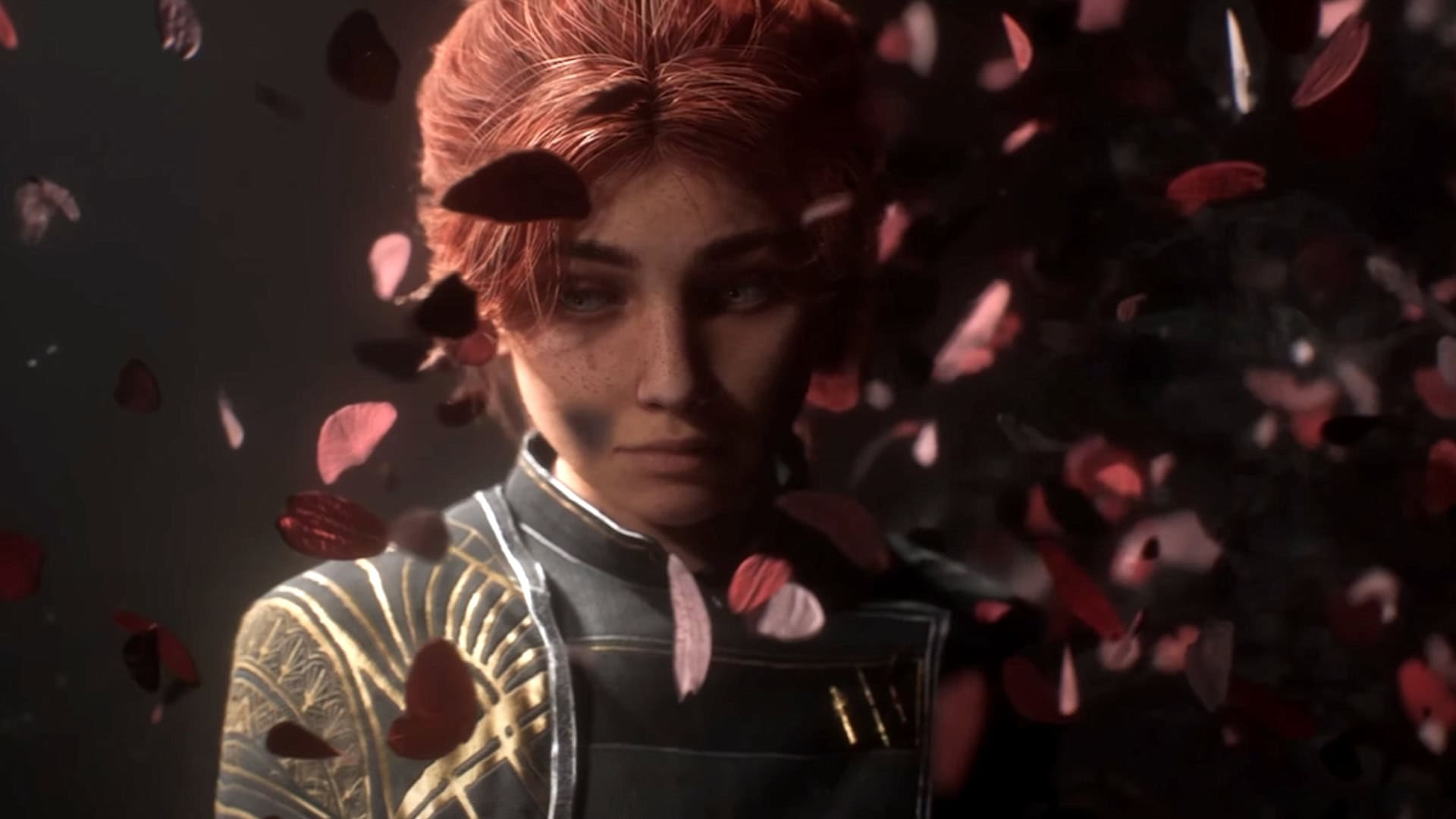 Photo of Maelle with flower petals floating around her. 