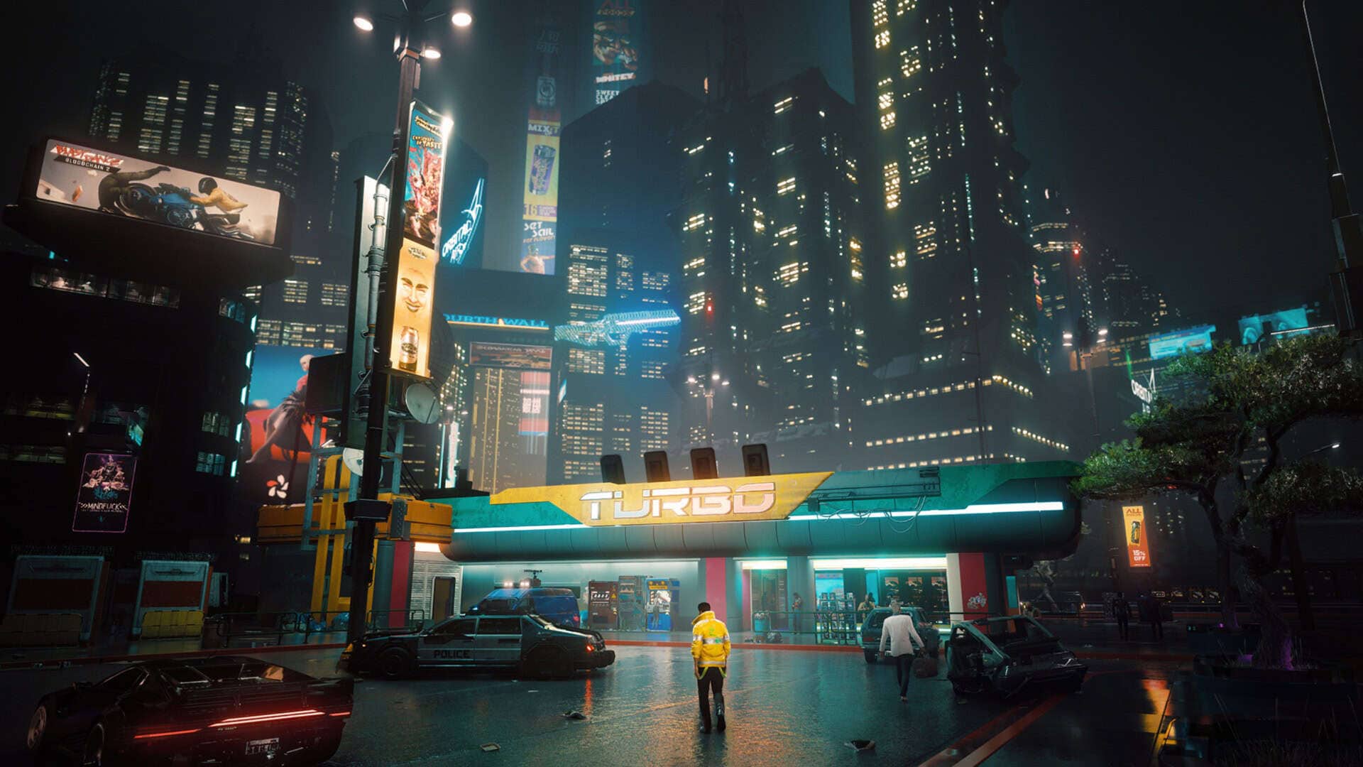 V walks into a building and the city in the background.