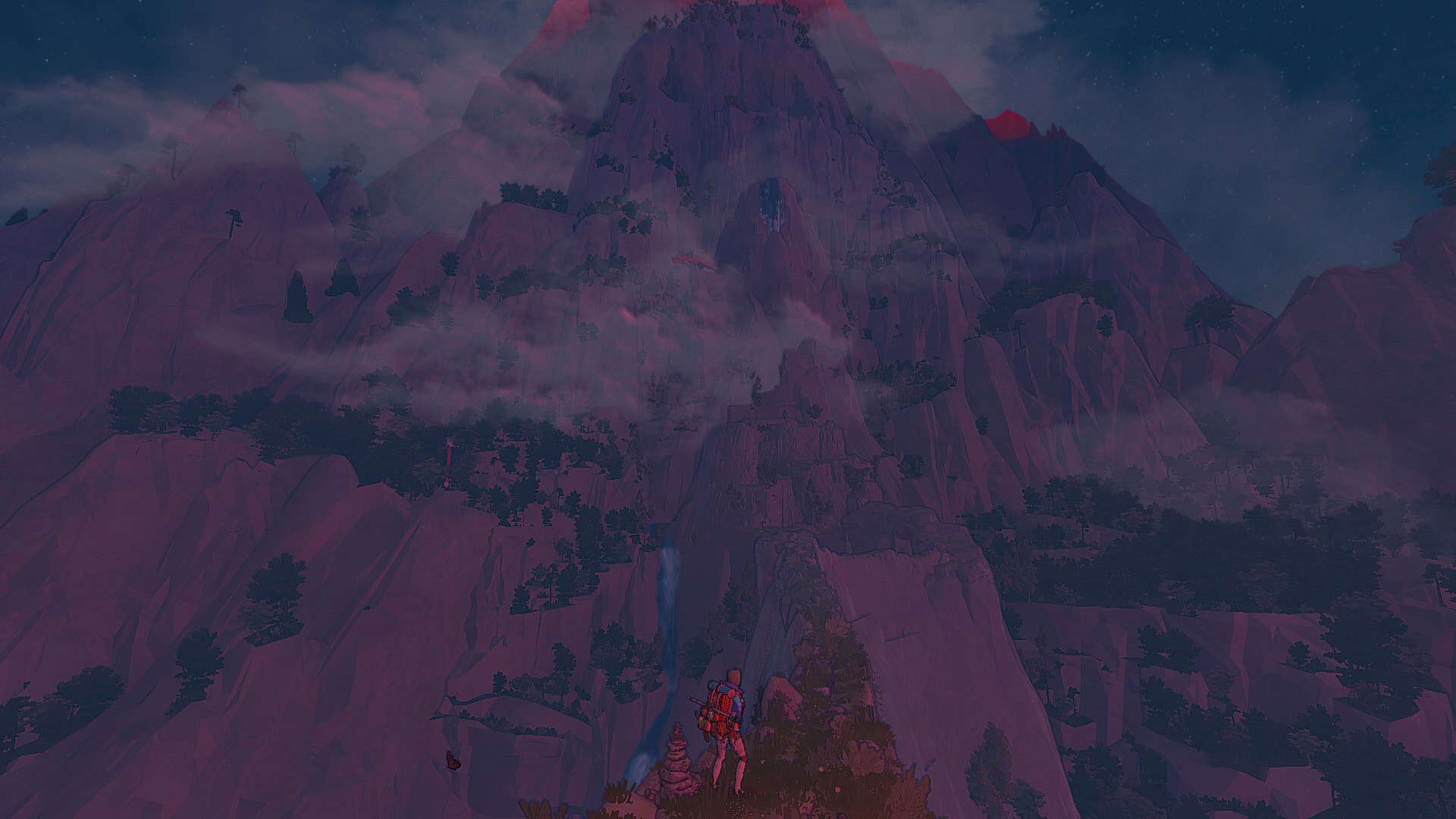 A wide shot of the mountain, the upcoming climb, Aava at the bottom