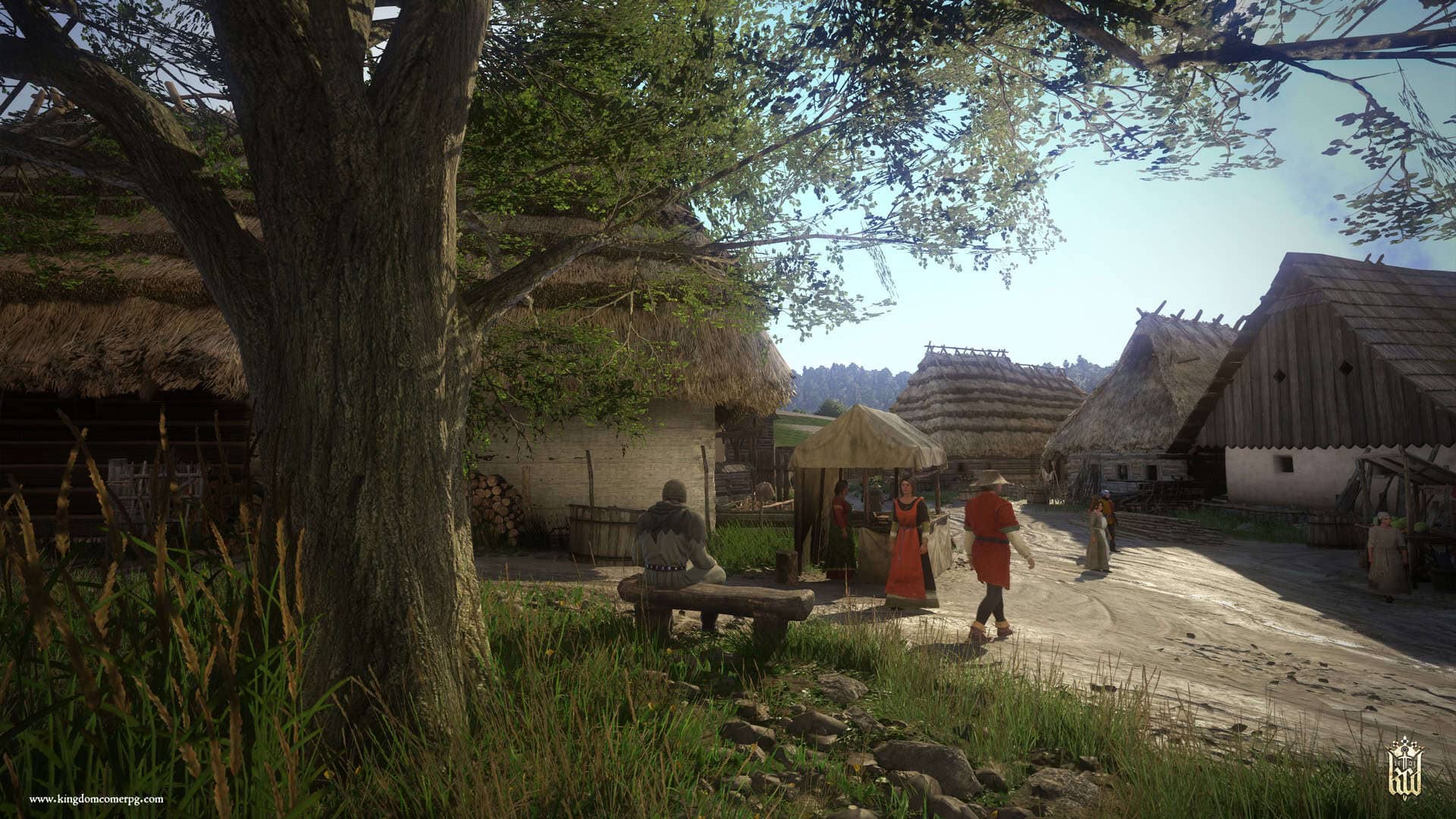 Kingdom Come Deliverance town screenshot showing people walking around a small medieval village