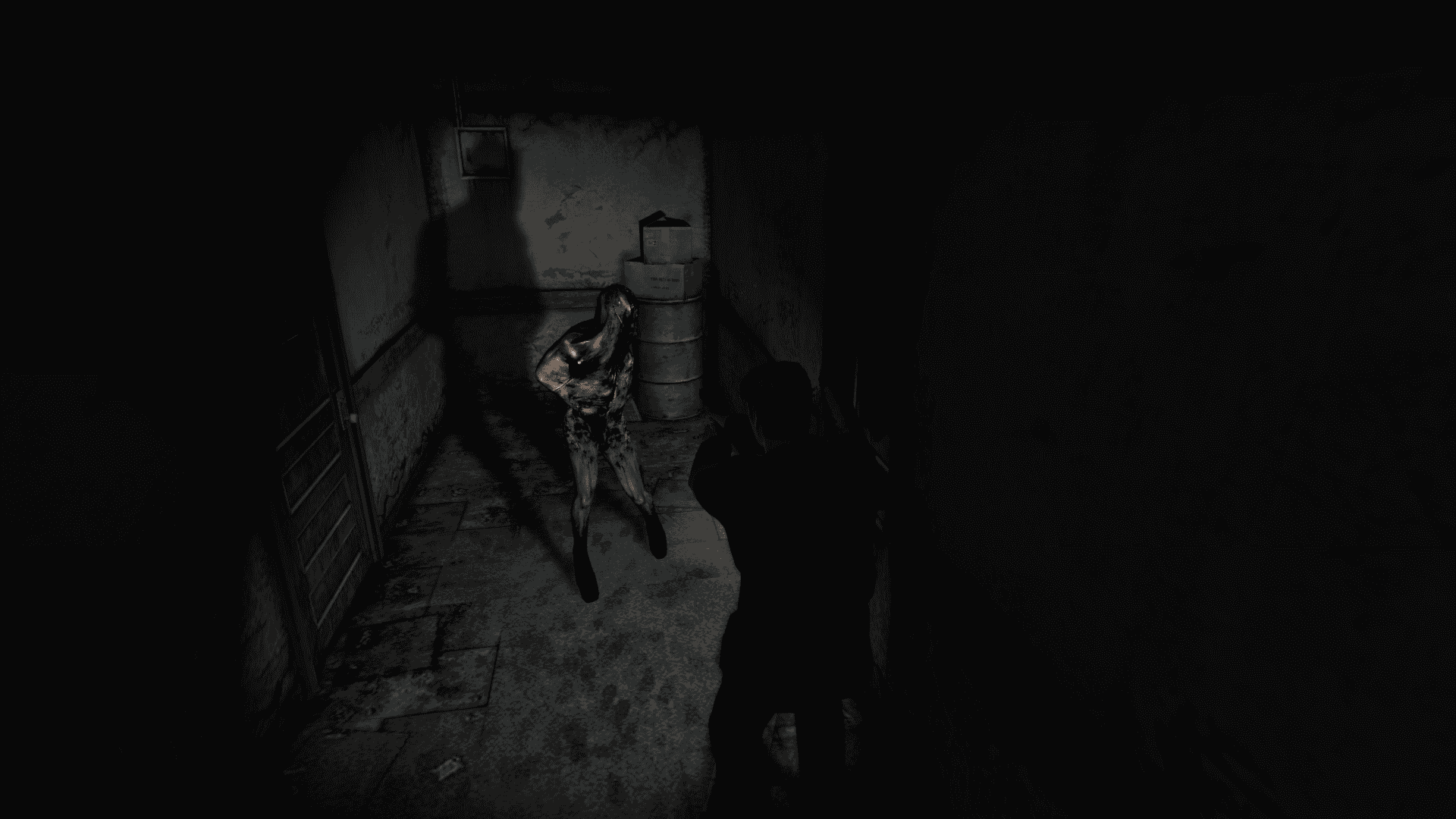 Silent Hill 2 Image of the protagonist pointing a gun at an enemy