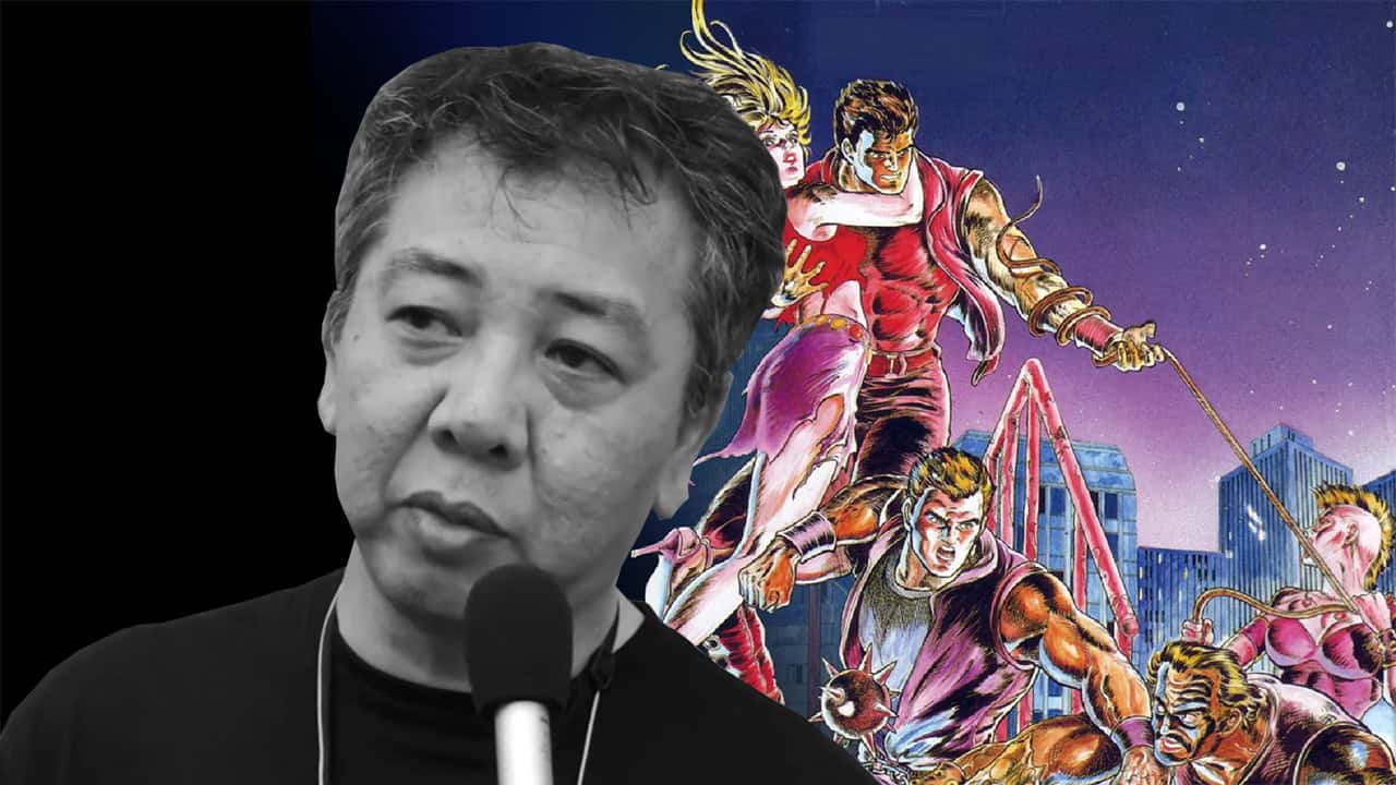 Yoshihisa Kishimoto with a Double Dragon illustration behind him