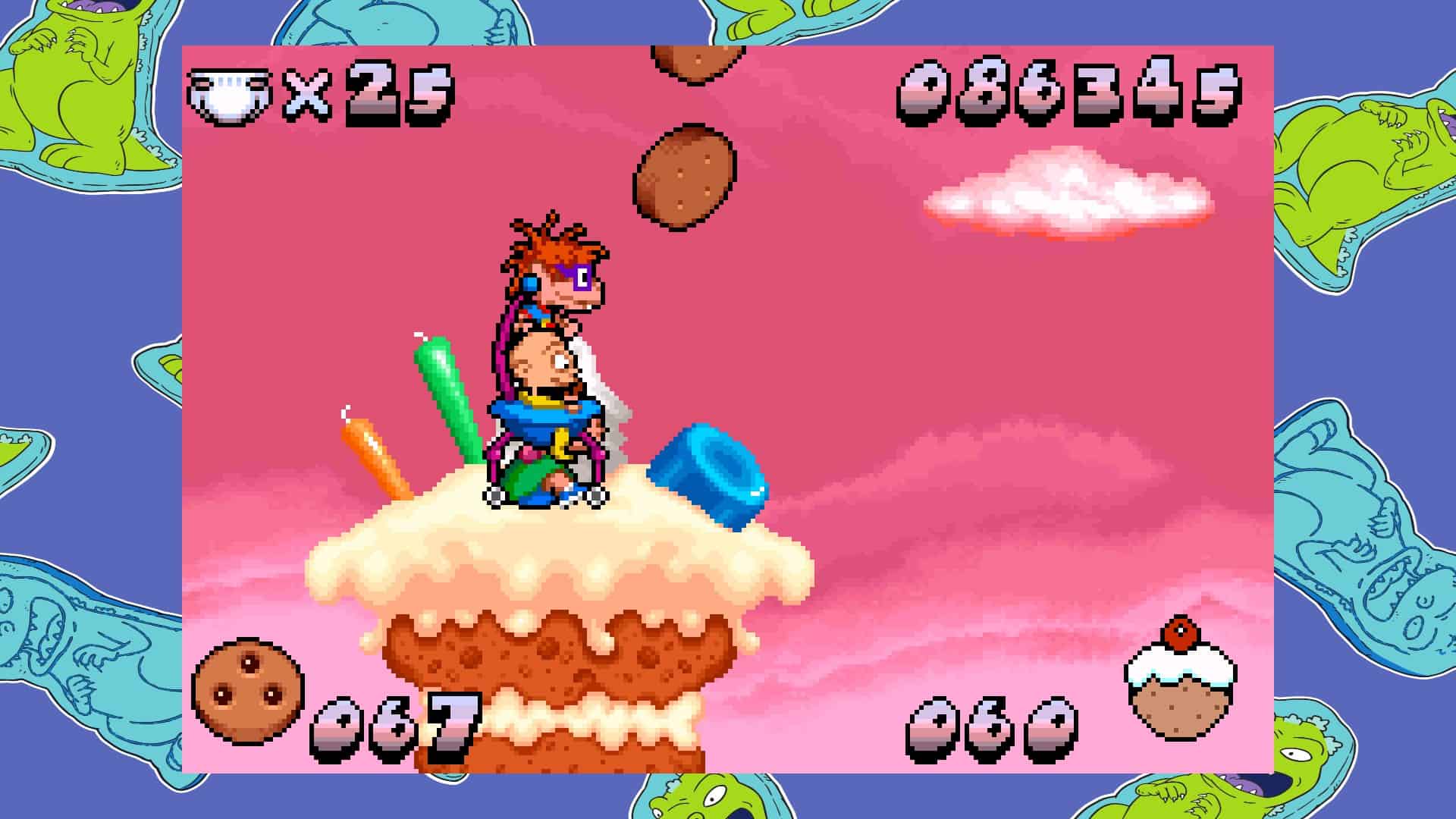 Screenshot of Rugrats: Castle Capers of characters standing atop a frosted cake platform