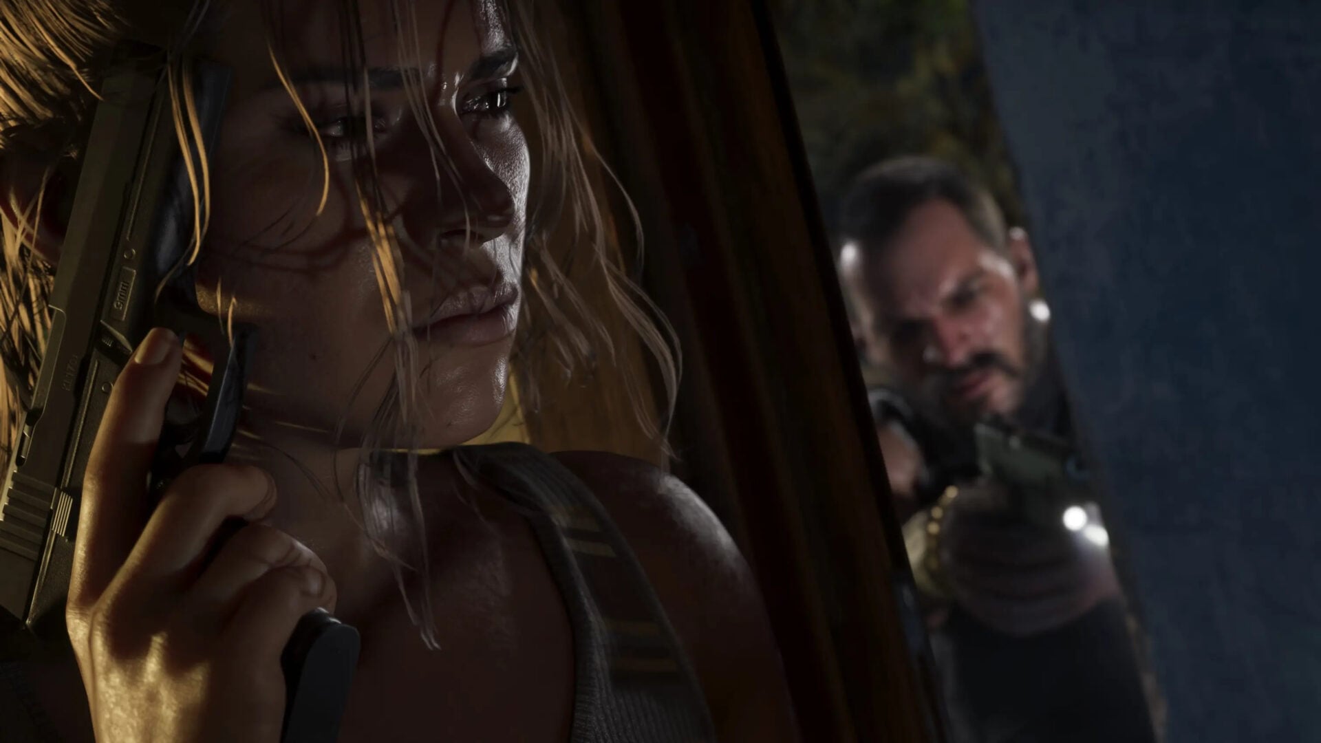GTA 6 screenshot of one of the characters hiding from a gunman