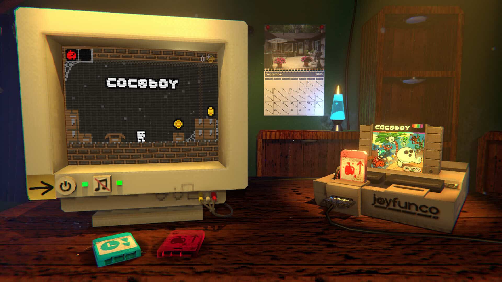 A 3D graphic image depicting a wooden desk where an old CRT monitor is connected to a super nintendo style retro console titled joyfunco. It has a cartridge inserted with the title "Cocoboy" and its illustration shows a round, white character with two black eyes and a round black mouth that resembles a white coconut with legs (no arms) running on a beach away from cartoon enemies. There is also a smaller dingy red cartridge inserted with an apple and an up arrow drawn in marker in one of the slots in front of the larger cartridge. A similar small blue cartidge with a clock and down arrow is laying in front of hte monitor. On the monitor is an 8-bit platformer with the same Cocoboy title and character, showing a dusty attic with many boxes and cobwebs as well as gold coins. Behind the desk is a calendar reading September 2005 and some shelves that are empty except for a blue lava lamp.