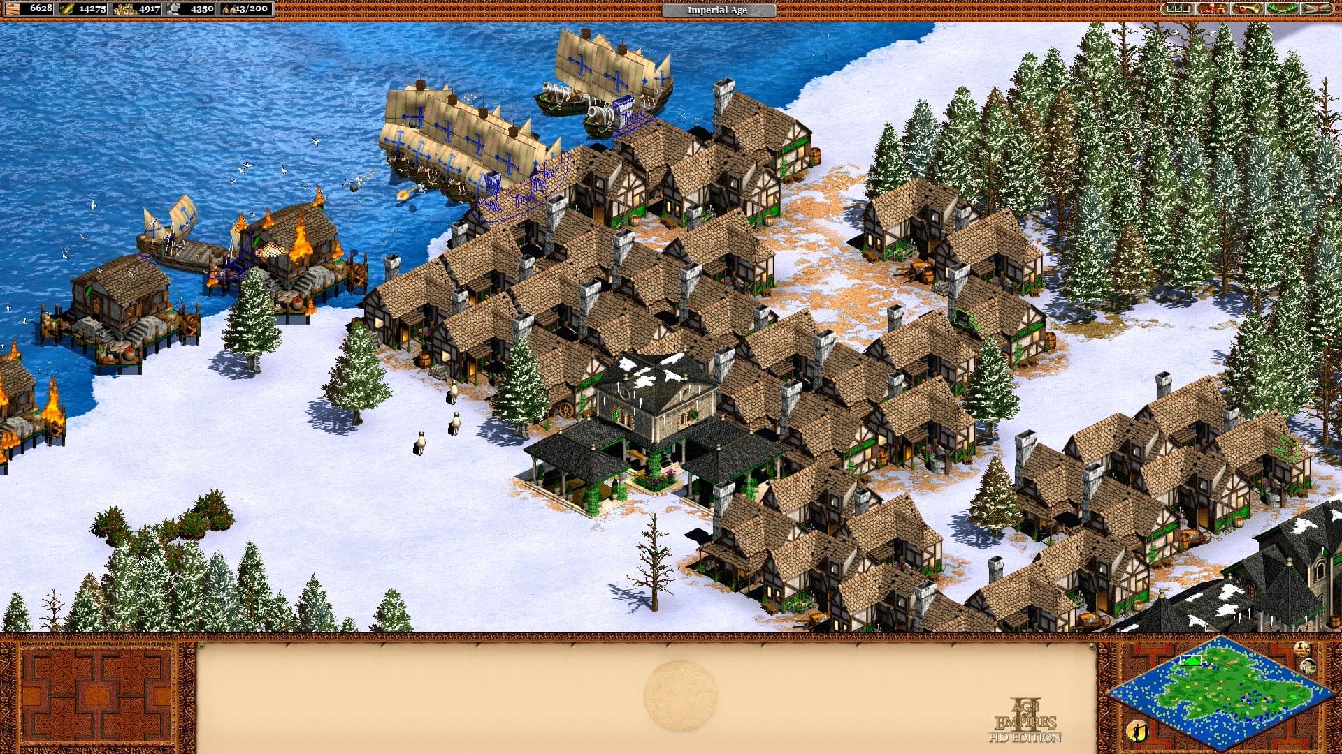 A screenshot from Age of Empires II showing a snow-covered map and a few rows of houses.