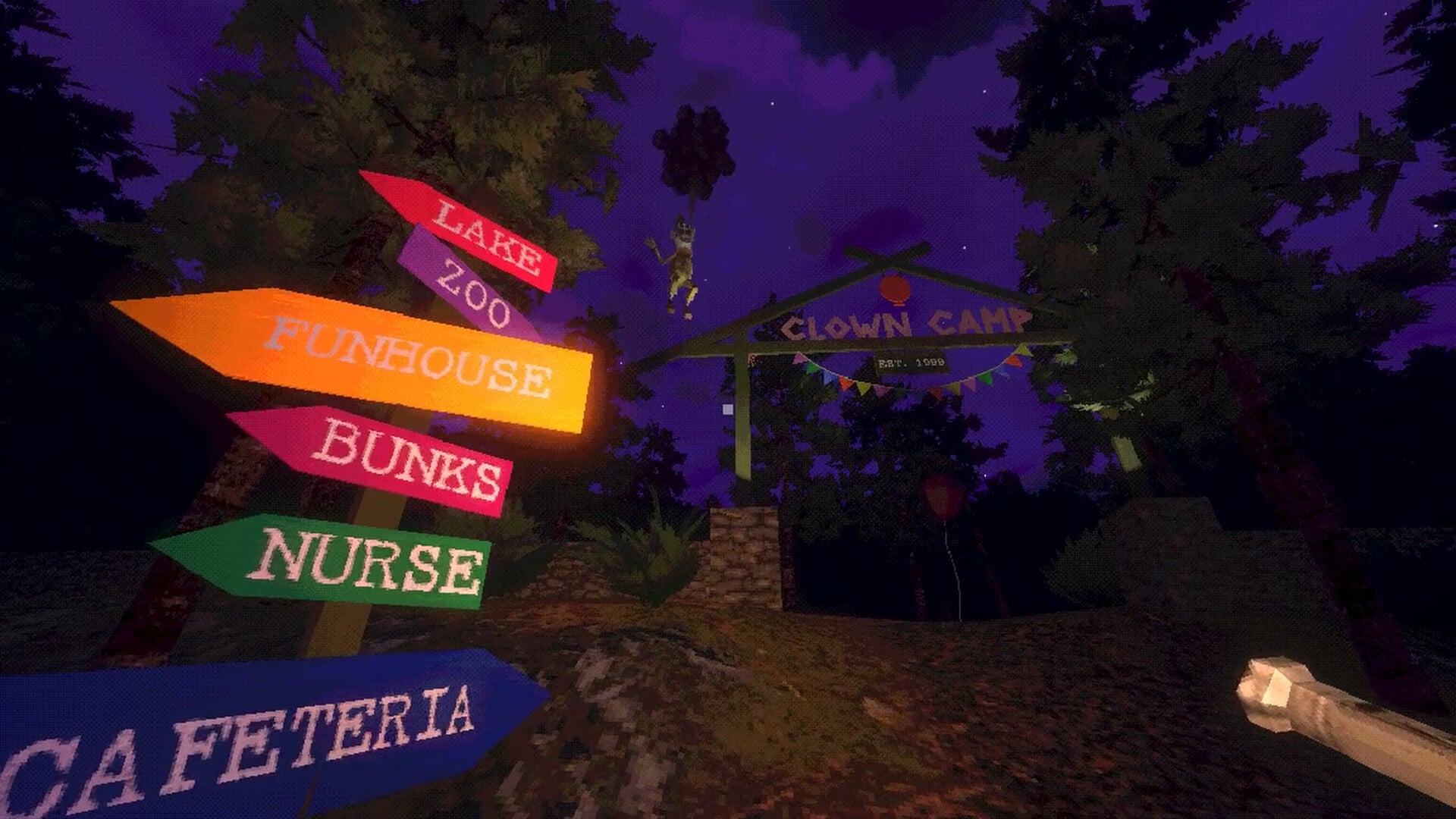 The festive-looking entrance to Clown Camp at night, decorated with banners and flags. In the foreground, next to the viewer, is a signpost pointing to various camp locations: Bunks, Nurse, Funhouse, Zoo. In the background, a clown is floating away into the night sky with a huge bunch of balloons in his hand.